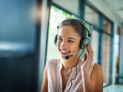 Shot of a young woman working in a call center