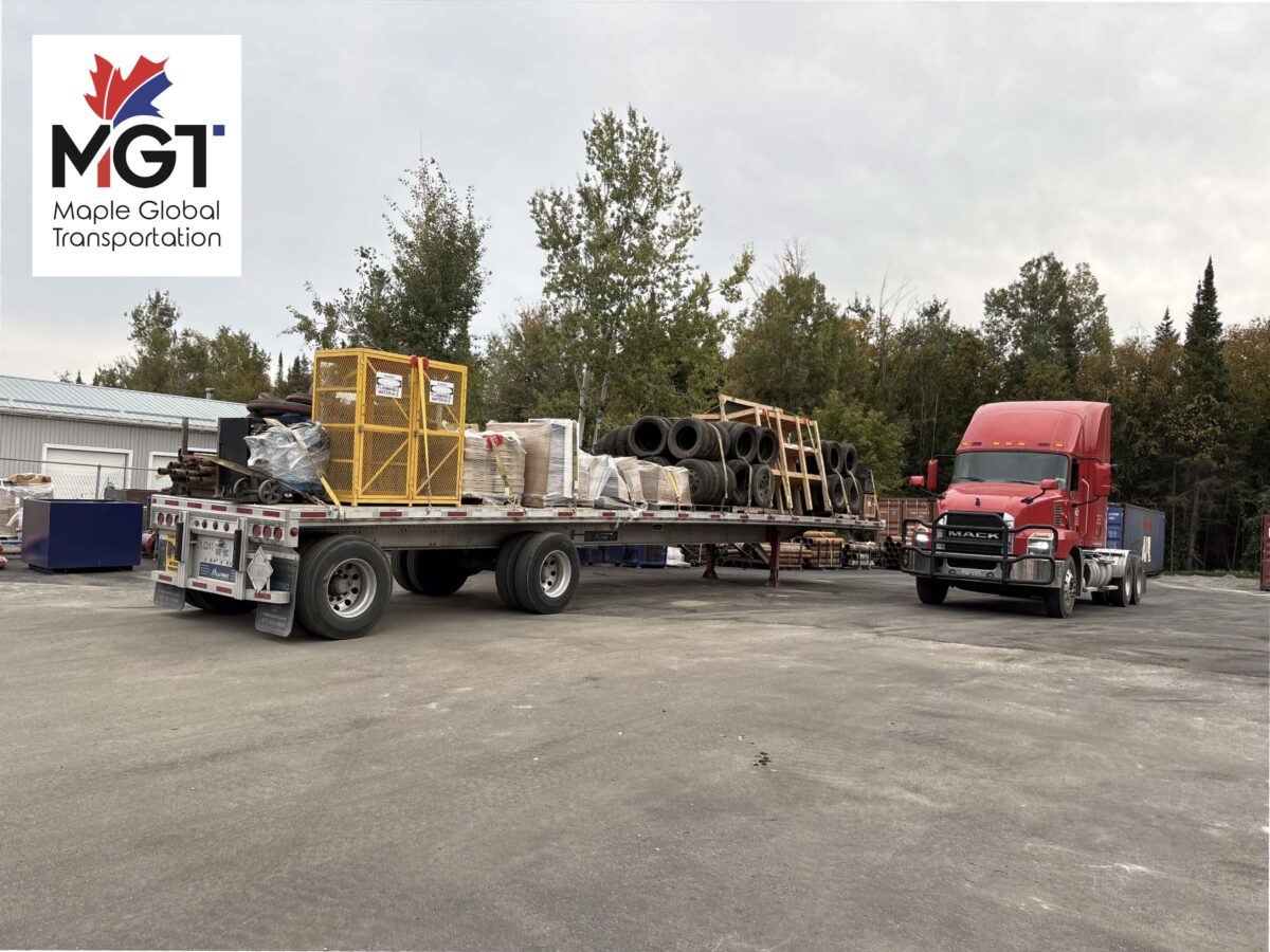 Maple Global Transport flatbed trucks transporting industrial equipment for water treatment projects in Ontario
